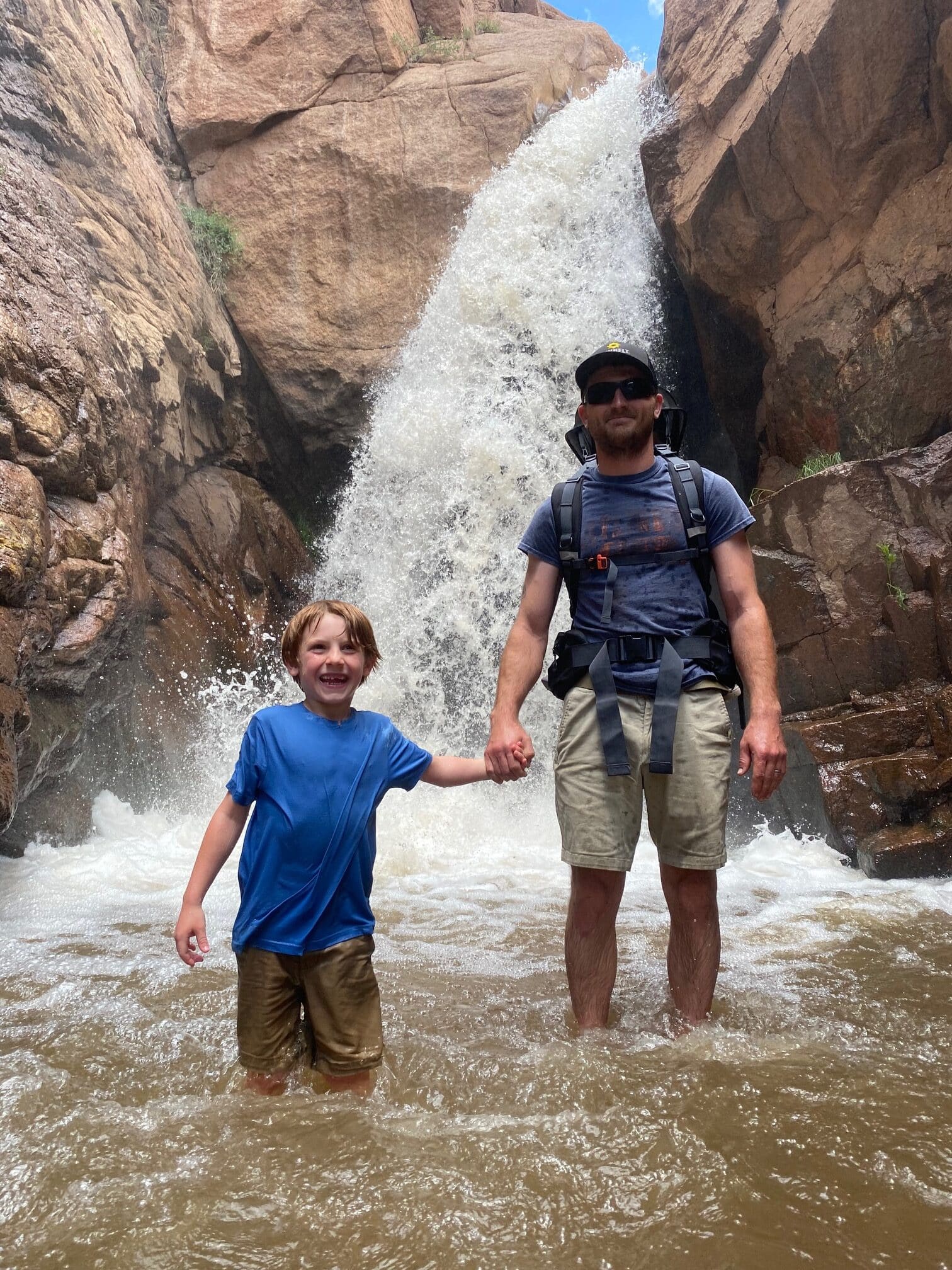 Family in Waterfall in Colorado near Pikes Peak in colorado Springs
