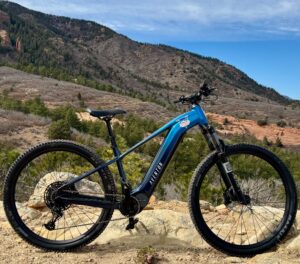 blue aventon bike in the mountains